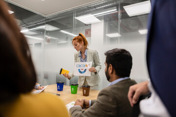 meeting of diverse businessmen and businesswoman talking about recycling