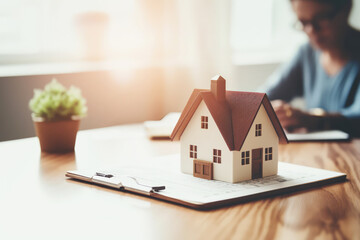 Sealing the Deal: Woman Signs Purchase Contract or Mortgage for a Home - Exploring the Real Estate Concept