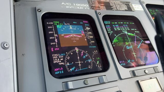Closeup view of the instrument panels of a modern jet in a real flight.