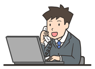 パソコンを使いながら電話対応する会社員の男性