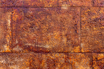 Rusty ancient stone brick wall close up textured background