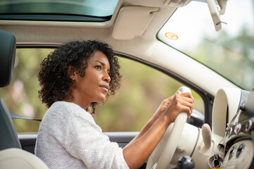 african american woman driving car