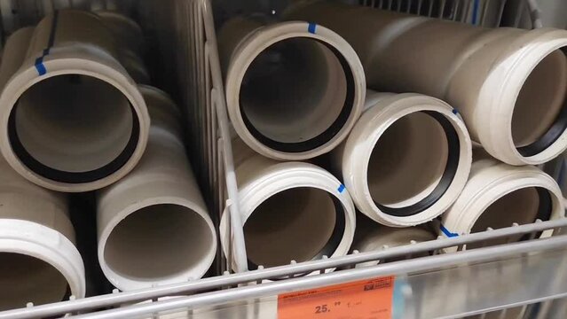 Antalya, Turkey, June 10, 2023. Grey plastic sewer pipes in the shop window