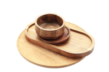 Different wooden plate and trays isolated on white background