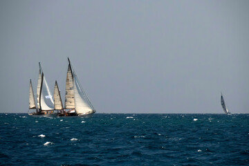 strong wind regatta in barcelona Sailing ship in a strong wind. Yachting