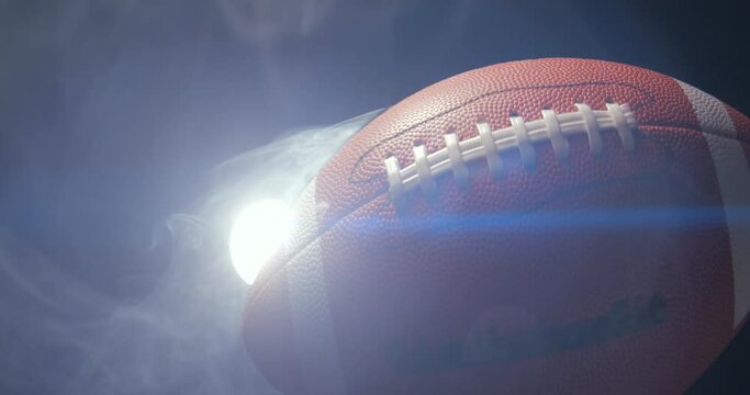 Football ball in studio with smoke anamorphic 4K