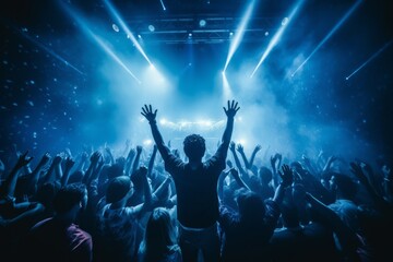 Fototapeta na wymiar DJ raised his hands at night club party under blue . generative ai.