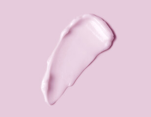 Pink cream smear over pink background. Cosmetic hydration cream smudge of liquid reach face or body cream, balm mask texture, top view. Skin care, facial cream, lotion