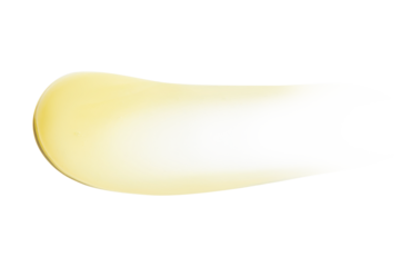 Smear of yellow cream, balm, conditioner with banana, egg or chamomile on an empty background. Isolated.