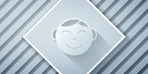 Paper cut Happy little boy head icon isolated on grey background. Face of baby boy. Paper art style. Vector