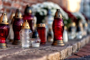 cemetery with flowers and grave candles