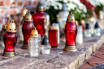cemetery with flowers and grave candles