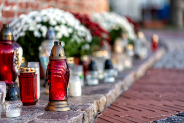 cemetery with flowers and grave candles