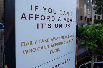 Sign at a local restaurant if you can't afford a meal it's on us, daily take away meals for who...