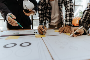 Civil engineer team meeting Modern construction planning meeting, foreman, industrial project manager, engineering team, professional team in Asian industry