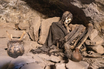 Fototapeta na wymiar Cementerio de Chullpas / Cueva de las Momias: Cave with mummies near Coqueza, a village at the edge of the famous salt flats Salar de Uyuni in Bolivia
