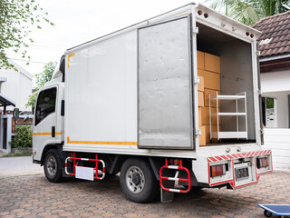 White shipping truck with parcel box