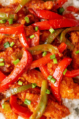 Homemade Simple Chili Chicken with White Rice on a Plate, top view. Flat lay, overhead, from above. 