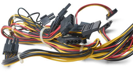 close-up of computer power supply cables, multicolored pc wiring harness isolated on white...