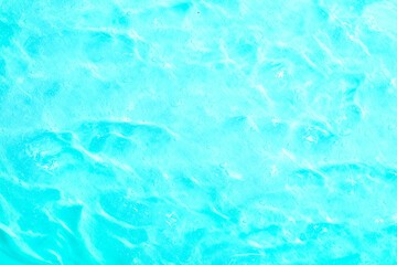 Cosmetic gel, serum transparent sample. Liquid cream with bubble texture. Gel texture of a cosmetic product. Clear liquid lotion for skin care.