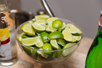 Illustrative photo of bartender, bar services. glass jar with chopped lemon, for preparing drinks