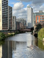 Obraz premium Modern buildings next to the river in Manchester city centre. 