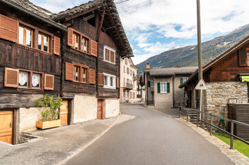 Fototapeta na wymiar Street in the small village Chironico, is a fraction of the municipality of Faido, in the Canton of Ticino, district of Leventina, Switzerland