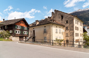 Fototapeta na wymiar Street in the small village Chironico, is a fraction of the municipality of Faido, in the Canton of Ticino, district of Leventina, Switzerland