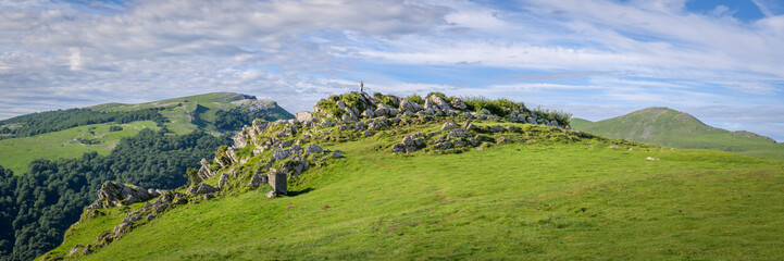 Obraz premium A small Statue of the Virgin Mary on the top of a m Pyrenees mountain ridge along the Way of Saint James