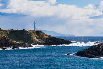 Lighthouse Overlooking Rocky Coast