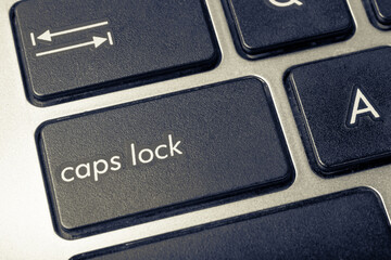 Caps lock button on the keyboard. Computer keyboard.