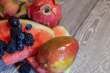 Mixed Fruit Collage on Wooden Background