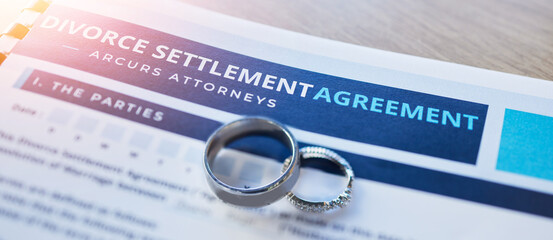 Ring, lawyer and paperwork for a divorce agreement, legal certificate or document for marriage....