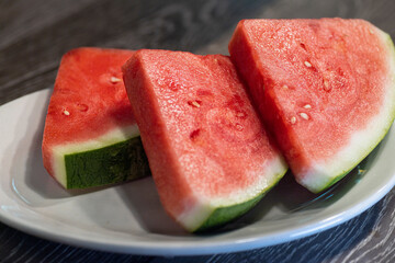 Fresh Sliced Watermelon on White Plate