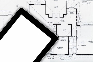 Buildings concept with cadastral drawings and digital tablet