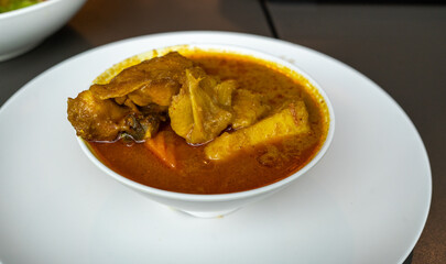 Authentic Thai Curry Chicken - Delectable Thai Style Food on White Background