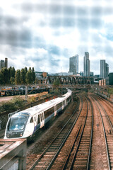 Overlooking a train through a fence