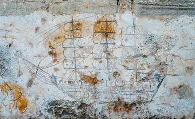 historical drawing of a three-masted sailing ship on the wall, Es Fortí, Cala d’Or, Santanyí, Majorca, Balearic Islands, Spain