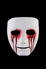 Creepy bloody mask isolated on black background with clipping path