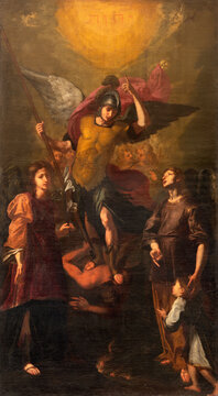 GENOVA, ITALY - MARCH 6, 2023: The painting of archangels Michael, Gabriel and Raphael in the church Basilica della Santissima Annunziata del Vastato by Niccolo Carlone (1644 - 1714).