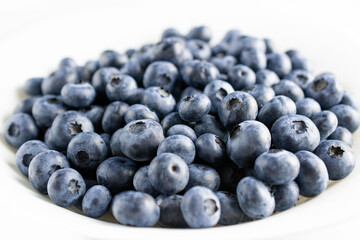 Big bowl full of blueberry close up