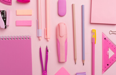 Pattern with pink school stationery on color backgroung, top view