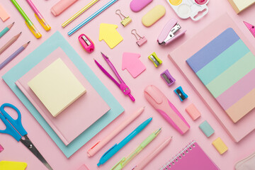 Flat lay with colorful school stationery on color backgroung, top view