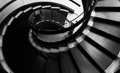 Black spiral staircase in restaurant