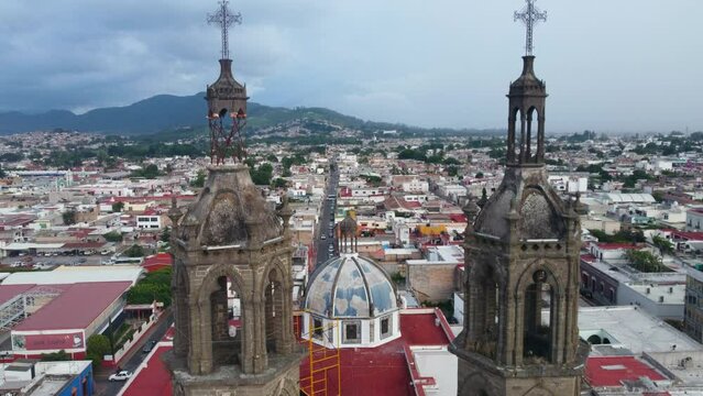 Cathedral Towers in the Foreground and the city of Tepic, Nayarit. Mexico, 