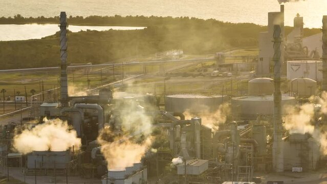 Industrial facility for chemical production of phosphoric acid polluting atmosphere with toxic emissions. Mosaic Riverview Plant in Tampa, Florida. Factory for handling and processing of phosphates