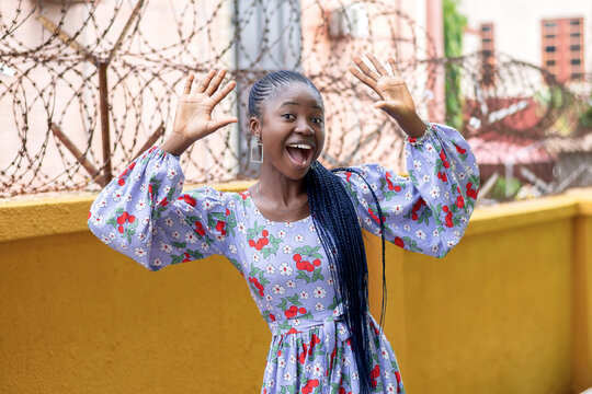 A Woman With Her Hands In The Air