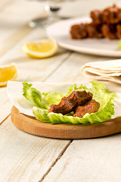 Raw meatballs or raw meatballs on a white wooden background. To close. local Turkish style raw meatballs