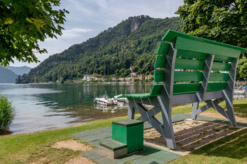 A giant green bench overlooking Lake Lugano, Caslano, Switzerland
