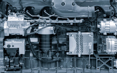 Blue diesel engine. Fragment of a diesel motor close-up. Selective on the fuel injection in the the...